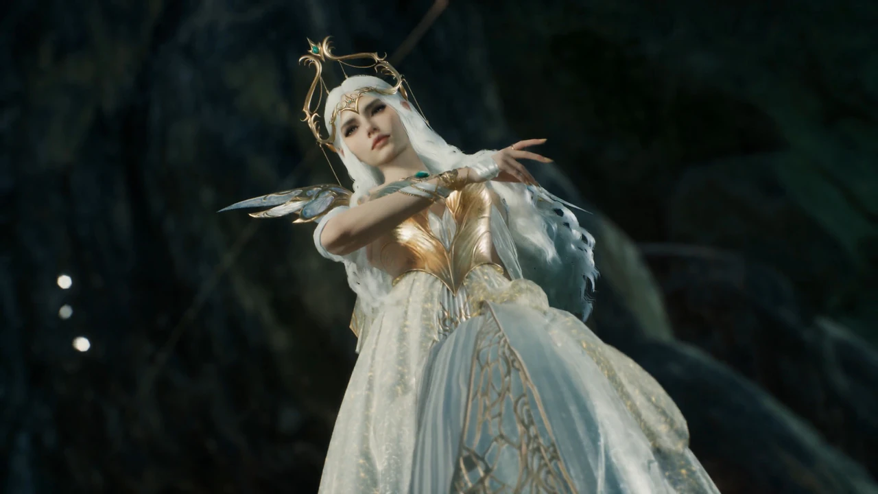 An ethereal goddess in white and gold with a delicate crown and flowing silver hair, set against a dark blurred background.